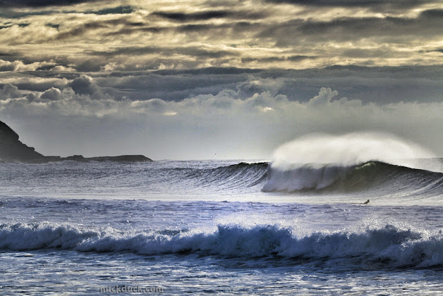 surfer surfing waves at gerringong beach sydney australia