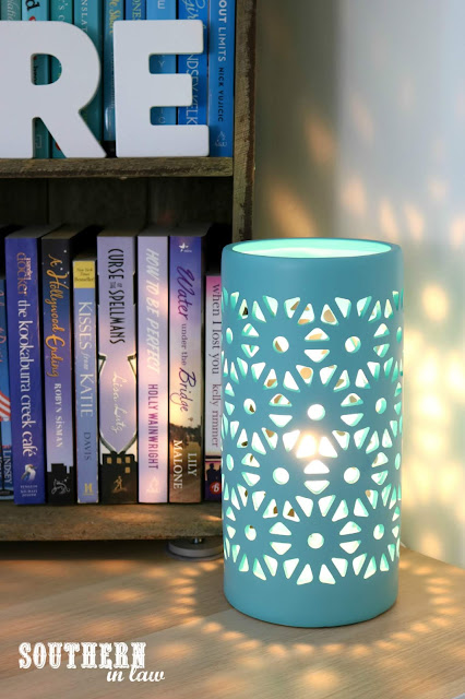 How to Create a Cosy Reading Nook In Your Home - Interior Design Home Ideas for Bookworms - Teal Ceramic Lamp