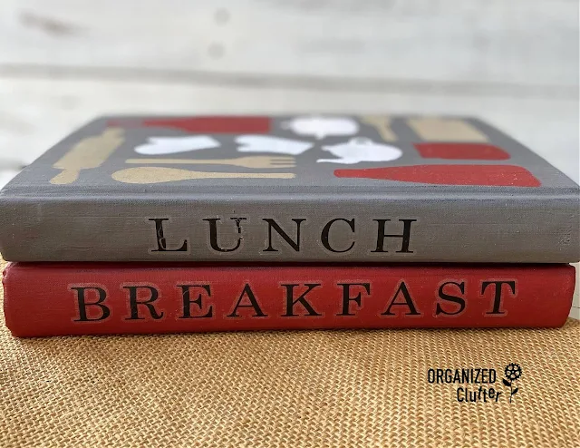 Photo of both book spines with rub on transfer titles