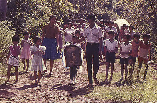 A procession in Cuyo held on the seventh birthday of a boy, and led by him and his family