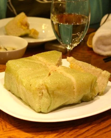 Steamed glutinous rice cake, cut into square pieces.