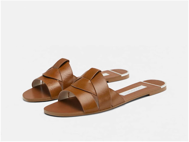 Zara's leather cross-over sandals on Island Atelier