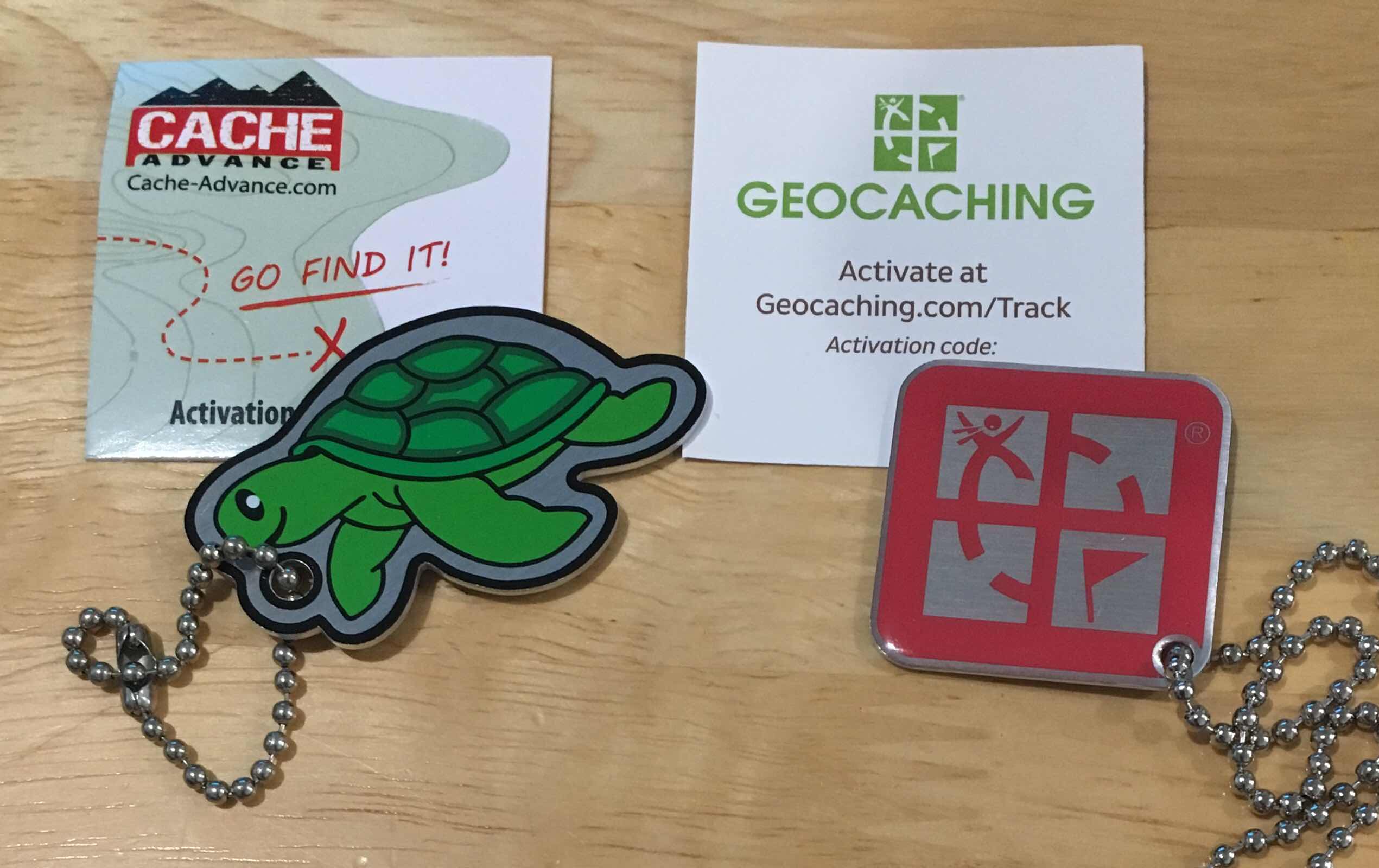 Turtle and geocaching logo trackable keyrings