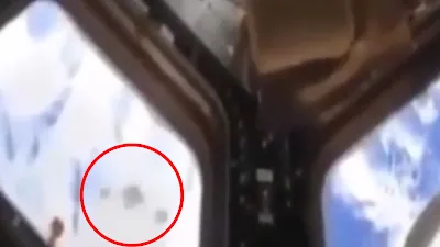Astronaut films 3 UFOs flying past the ISS.