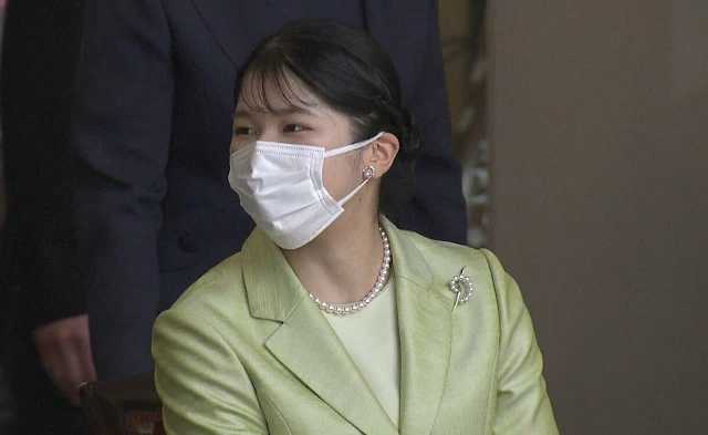Princess Aiko wore a green silk and satin jacket, and a light green wool midi dress at Imperial Palace