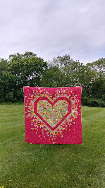 Exploding Heart quilt in Kaffe Fassett Parakeet fabrics