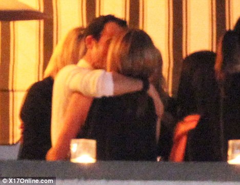 But Justin Theroux wasn't shy about showering Jennifer Aniston with kisses