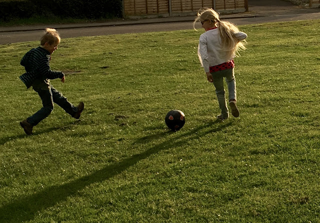 children playing football