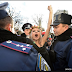 Photo; Woman Almost Strips Off Her Clothes During Protest For Gay Rights In Ukraine