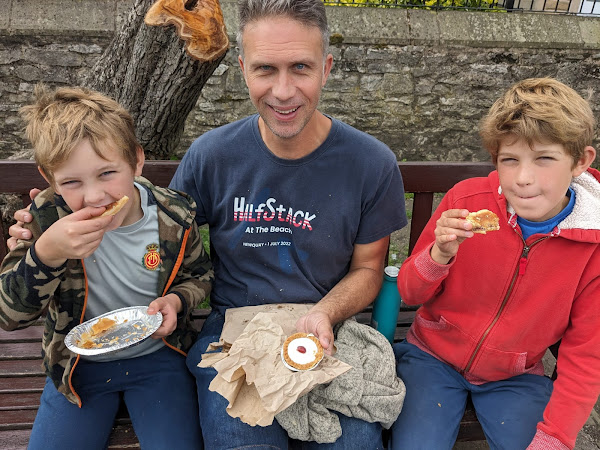 me and thde boys eating bakewell ouddings and tarts