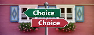 A pair of street signs. The upper one is green, points left, and reads "Choice". The lower one is red, points right, and also reads "Choice".