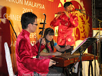 The 3 piece Traditional Chinese Band performing live at Nikon's appreciation and CNY dinner event