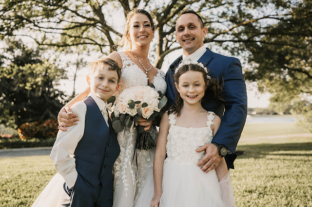 Bride and Groom portrait with ring bearer and flower girl