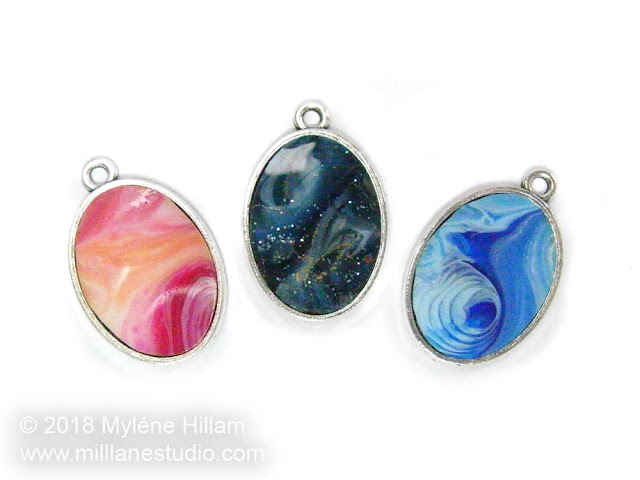 Trio of pink, navy and blue resin pendants