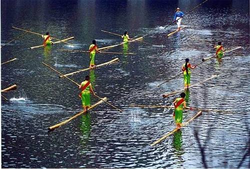 Crossing the river with a bamboo China