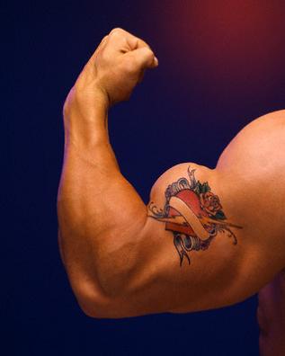 muscle tattoos. Rose Heart Tattoos.
