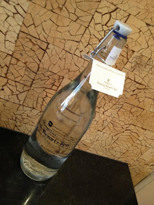 Bottled water from the Shangri-La's own glass bottling plant