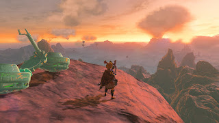 on the cliffs of Death Mountain, with my hover bike and Korok Mask, looking at the sunset