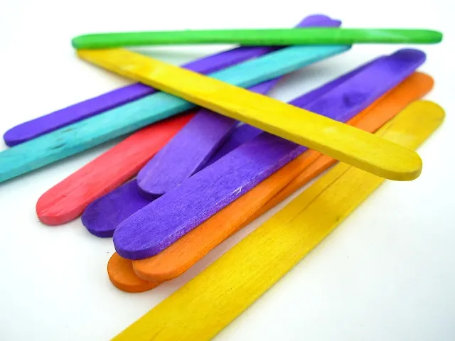 Many colorful ice cream sticks