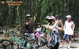 Family Ride and take picture inside Bamboo Forest Bali Countryside Cycling Tour Tracks