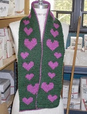 http://www.ravelry.com/patterns/library/trailing-hearts-double-knit-scarf