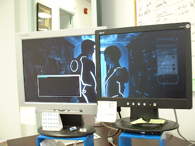 sam flynn quorra tron legacy dual monitor desktop wallpaper in action