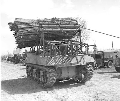 Tank transporter M19 ET Sherman. Loading%20the%20Fascines%20in%20to%20Sherman%20%20Carrier.%20rear%20viewr%20%20Ronco,%20Italy%20-%204-4-45