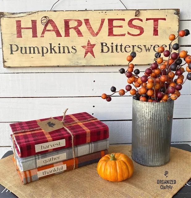 Photo of books covered with plaid flannel fabric.