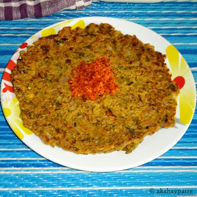 ghee applied on thalipeeth