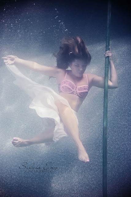 Underwater Pole dance