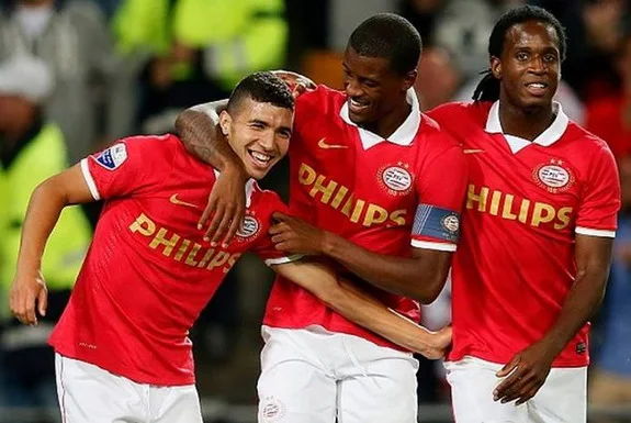 Zakaria Bakkali celebrates with PSV teammates after scoring a goal against NEC