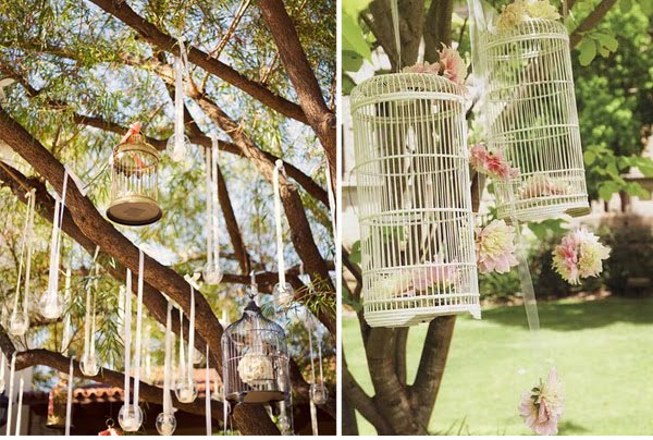 Vintage birdcage decor Credit tarynwardweddingsblogspotcom 