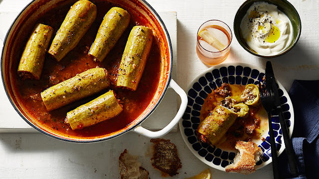 kousa mahshi in a cooking pot and in a serving dish