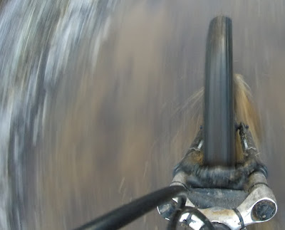 Cycling through another icy puddle