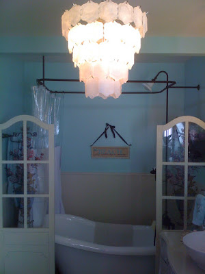 bathtub shower combo. clawfoot tub/shower combo.