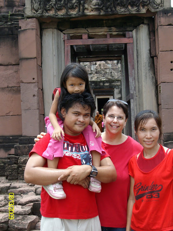 Christie with Rin (God-child), husband Kim, and daughter Esther