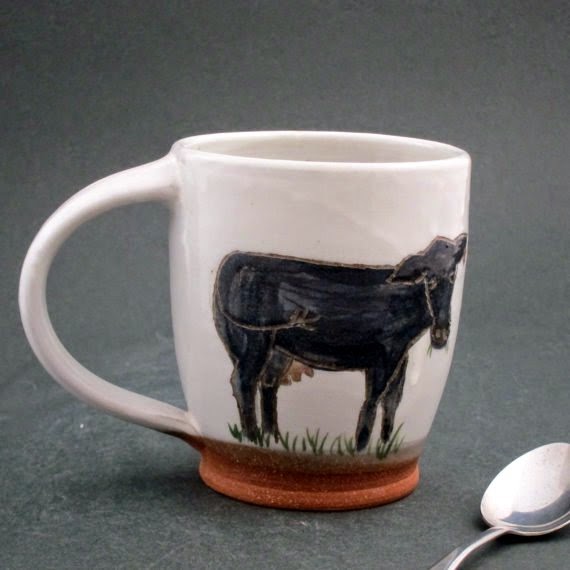 https://www.etsy.com/listing/214062659/ceramic-cow-mug?ref=favs_view_6