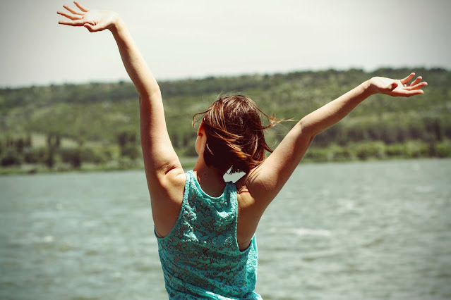 Woman with her hands in the air