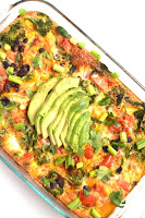 This Mexican Breakfast Casserole is simple to make and is full of flavor with black beans, salsa, bell peppers, avocado and cilantro! www.nutritionistreviews.com