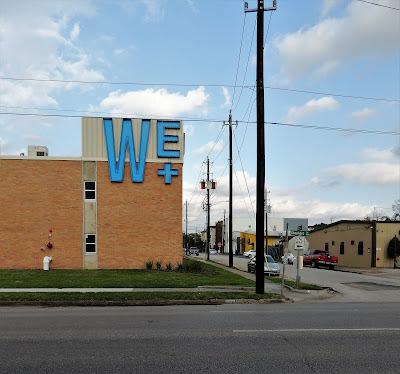 WE + in blue signage - Shepherd at Rose St. 