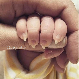 Baby born with perfect manicured long nails