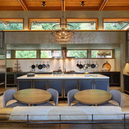 modern gray and beige wood kitchen with crystal chandelier