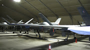 He operates the weapons systems on the drone aircraft in Afghanistan. (hangar of death)
