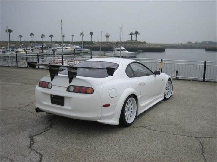 Here is a collection of white toyota supra with different modifications