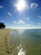 Heron Island is a small coral reef island 70km off the northeastern coast of . (heron island )