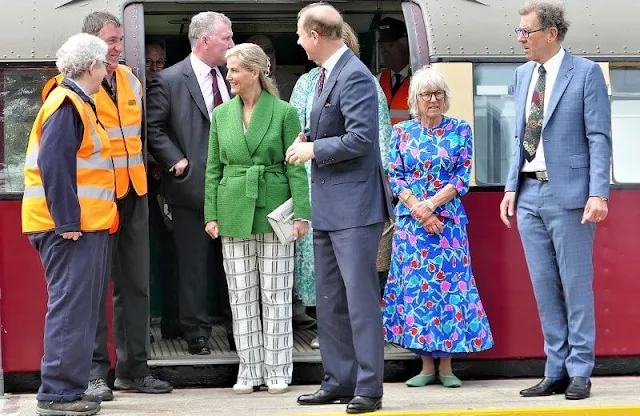 Countess of Wessex wore a Linda wool blend emerald-green blazer by Giuliva Heritage, and checked straight-leg trousers by Victoria Beckham