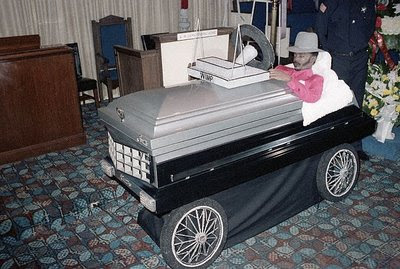 Dead man in his cadillac coffin car