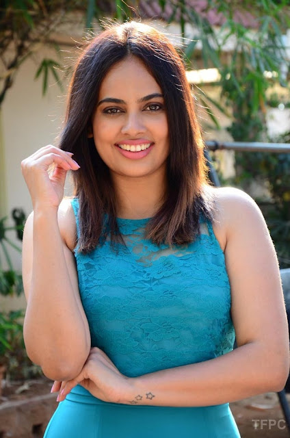 Nandhitha Swetha latest hot pics in sleeveless dress