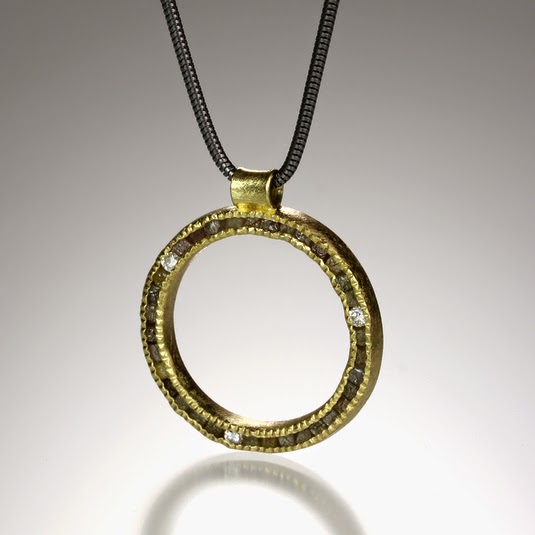 http://www.quadrumgallery.com/jewelry/product/diamond-circle-necklace