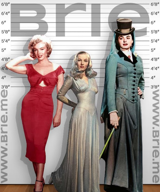 Veronica Lake standing with Marilyn Monroe and Ingrid Bergman